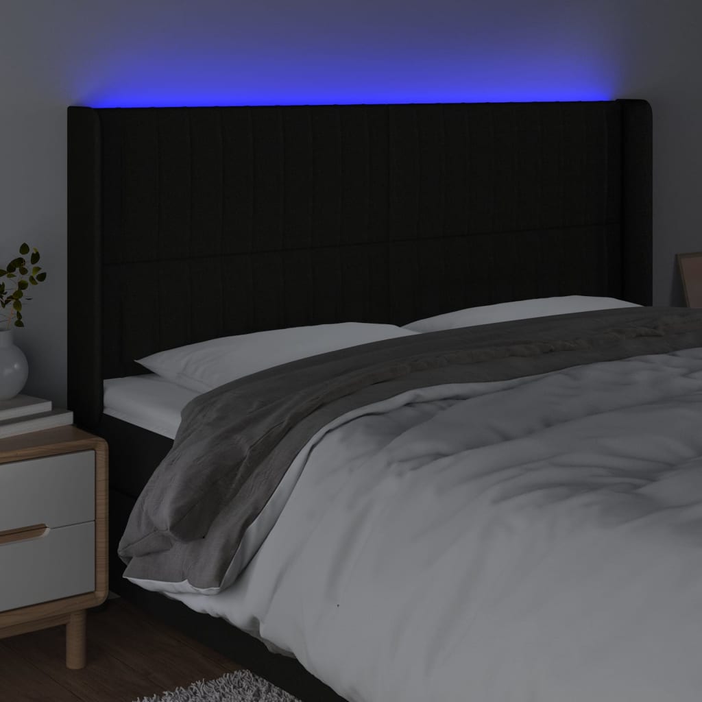 sengegavl med LED-lys 163x16x118/128 cm stof sort