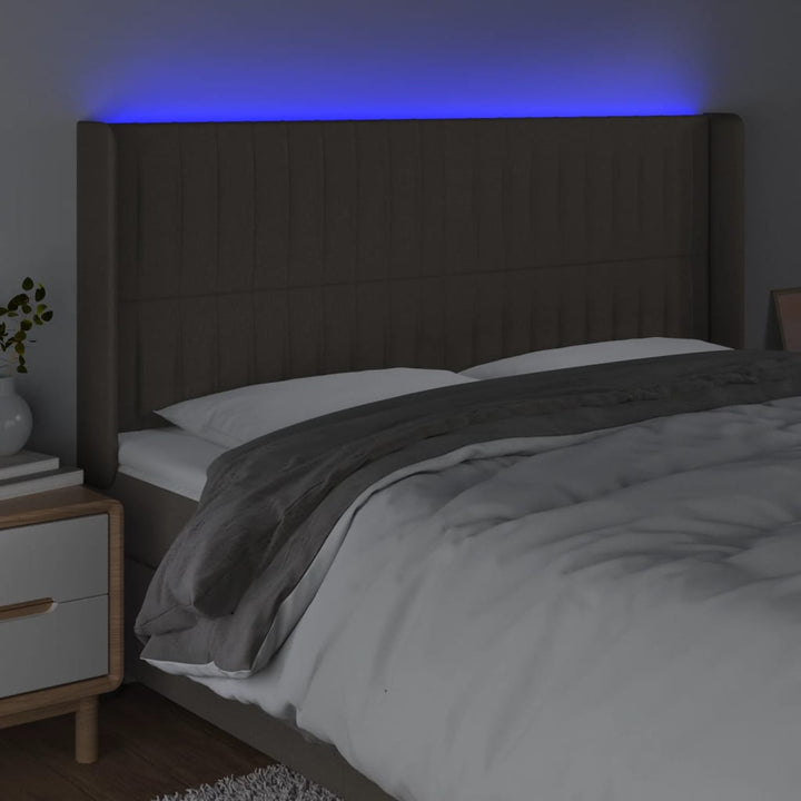 sengegavl med LED-lys 163x16x118/128 cm stof gråbrun