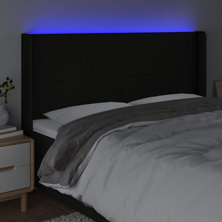 sengegavl med LED-lys 183x16x118/128 cm stof sort