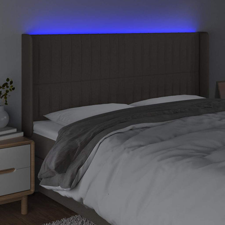 sengegavl med LED-lys 183x16x118/128 cm stof gråbrun