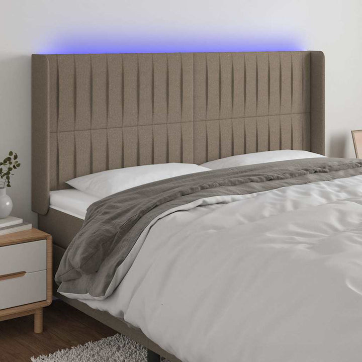 sengegavl med LED-lys 183x16x118/128 cm stof gråbrun