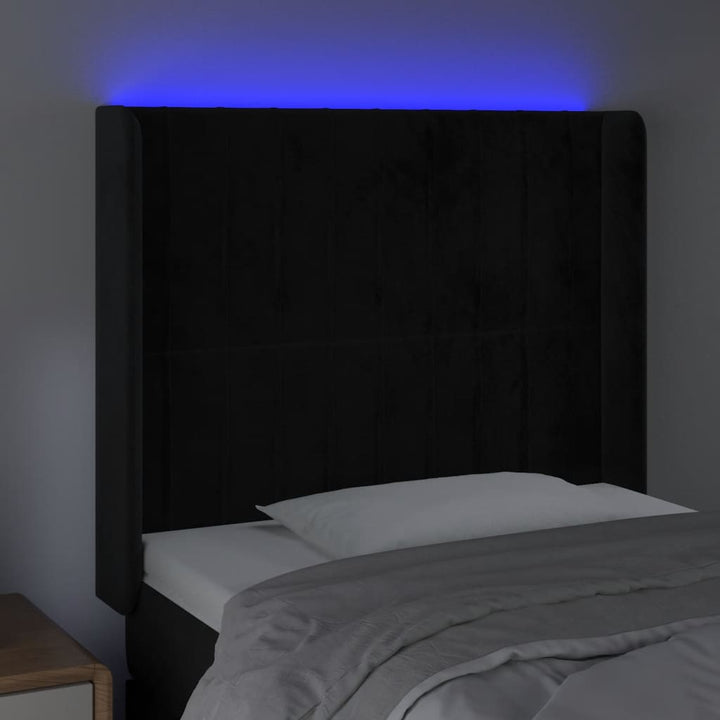 sengegavl med LED-lys 103x16x118/128 cm fløjl sort