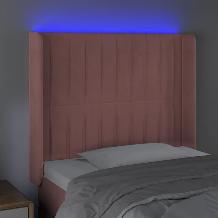 sengegavl med LED-lys 103x16x118/128 cm fløjl lyserød