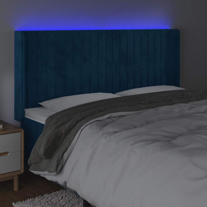 sengegavl med LED-lys 183x16x118/128 cm fløjl mørkeblå