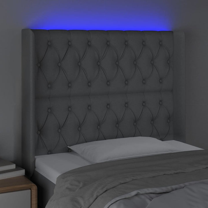 sengegavl med LED-lys 93x16x118/128 cm stof lysegrå