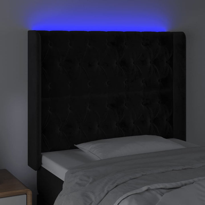 sengegavl med LED-lys 103x16x118/128 cm fløjl sort