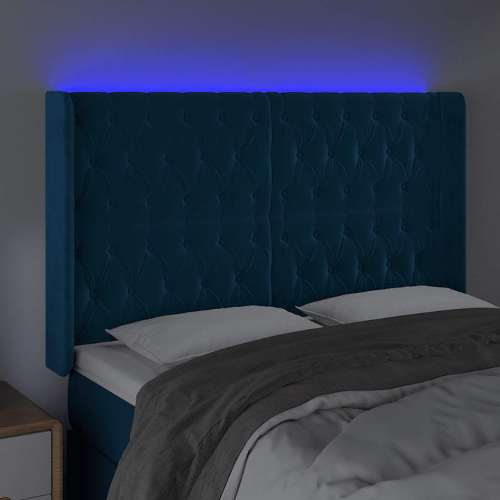sengegavl med LED-lys 163x16x118/128 cm fløjl mørkeblå
