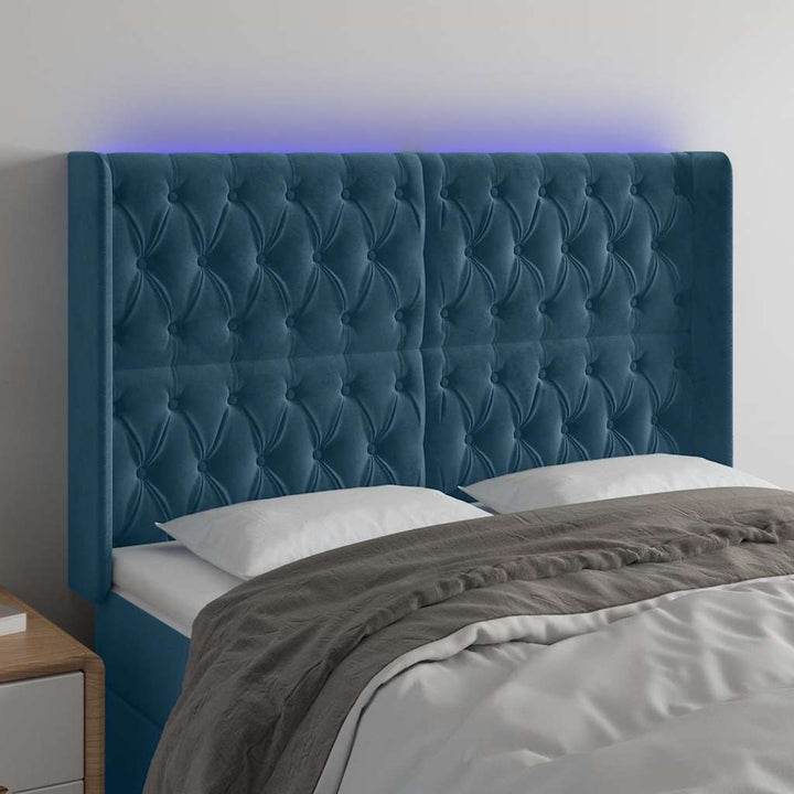 sengegavl med LED-lys 163x16x118/128 cm fløjl mørkeblå