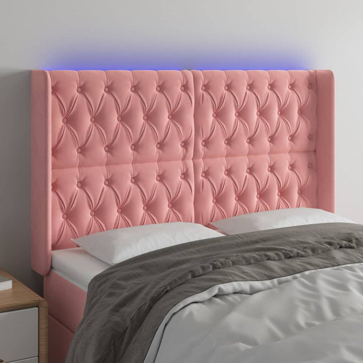 sengegavl med LED-lys 163x16x118/128 cm fløjl lyserød