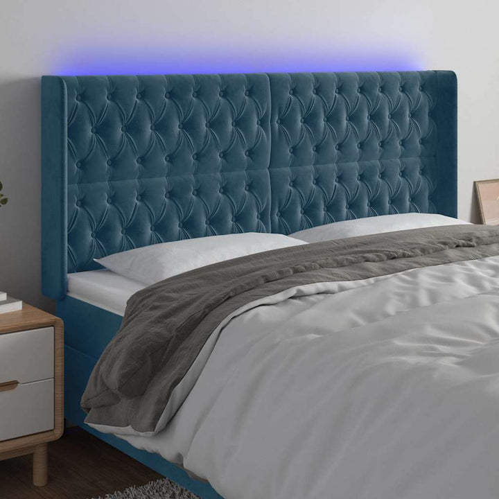 sengegavl med LED-lys 183x16x118/128 cm fløjl mørkeblå