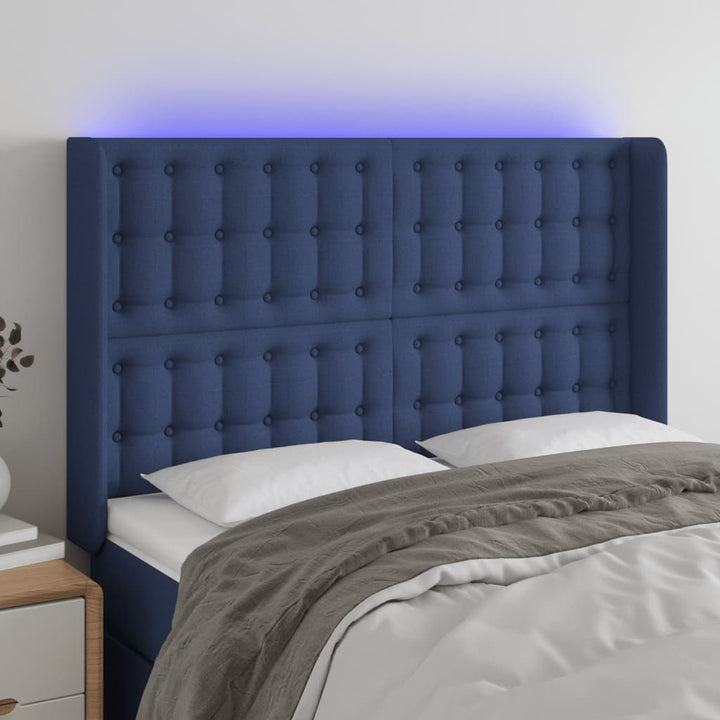 sengegavl med LED-lys 147x16x118/128 cm stof blå