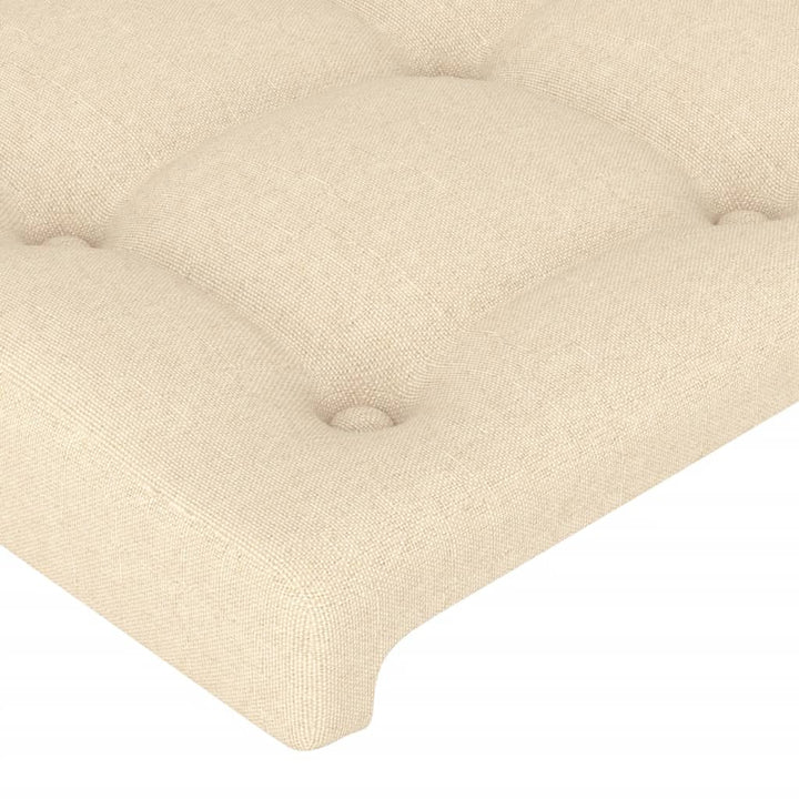 sengegavl med LED-lys 203x16x118/128 cm stof cremefarvet