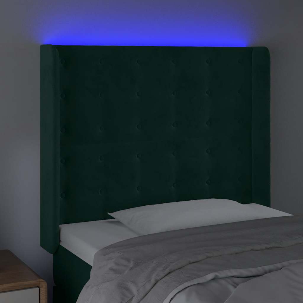 sengegavl med LED-lys 83x16x118/128 cm fløjl mørkegrøn