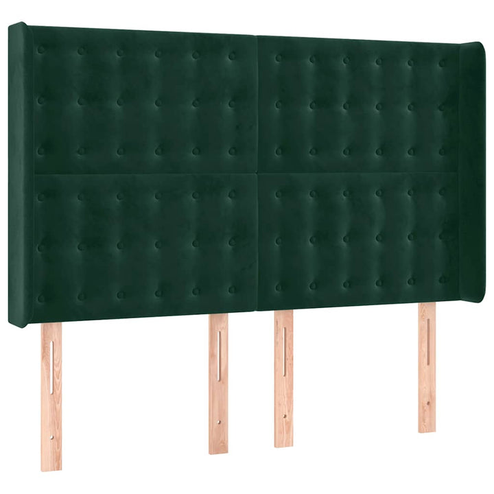 sengegavl med LED-lys 147x16x118/128 cm fløjl mørkegrøn