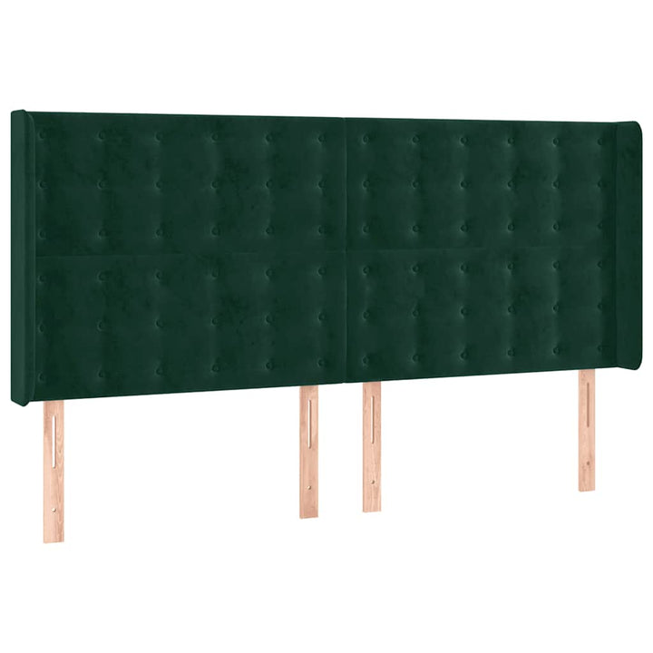 sengegavl med LED-lys 163x16x118/128 cm fløjl mørkegrøn