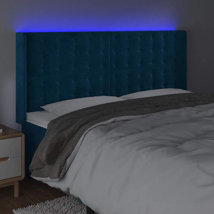 sengegavl med LED-lys 163x16x118/128 cm fløjl mørkeblå