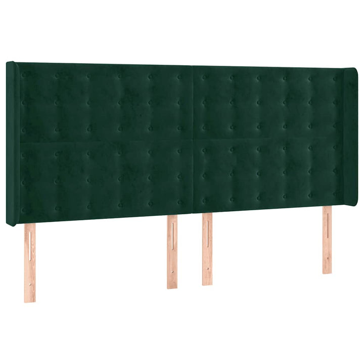 sengegavl med LED-lys 203x16x118/128 cm fløjl mørkegrøn