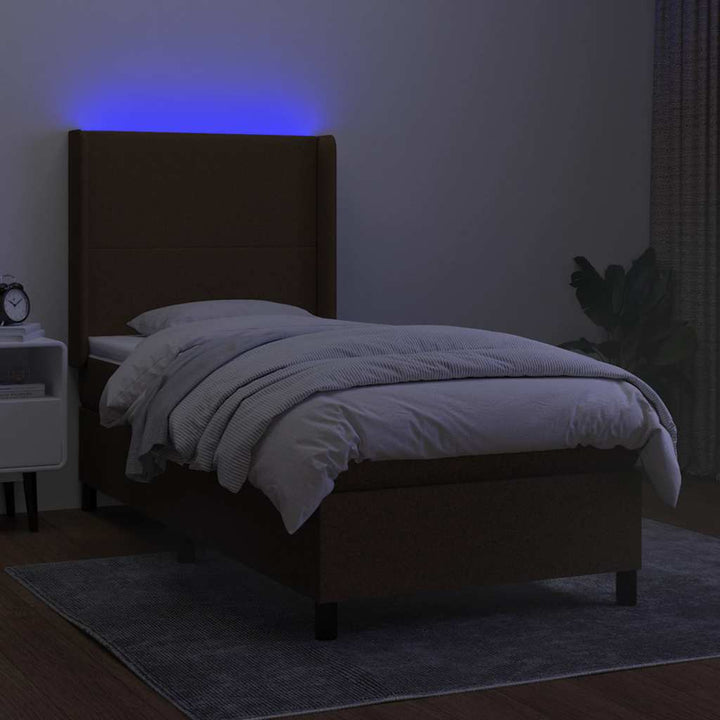 kontinentalseng med LED-lys 90x190 cm stof mørkebrun