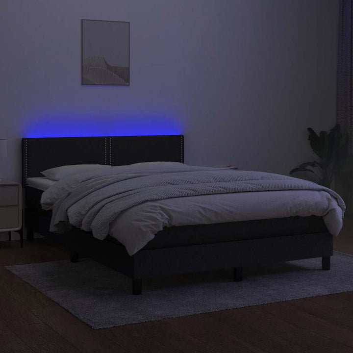kontinentalseng med LED-lys 140x200 cm stof sort