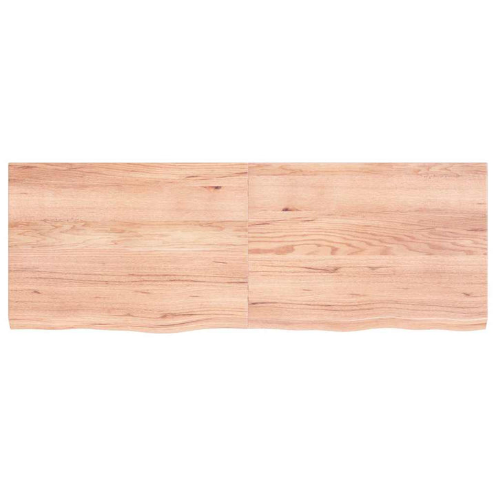 bordplade 140x50x(2-4) cm behandlet massivt egetræ lysebrun