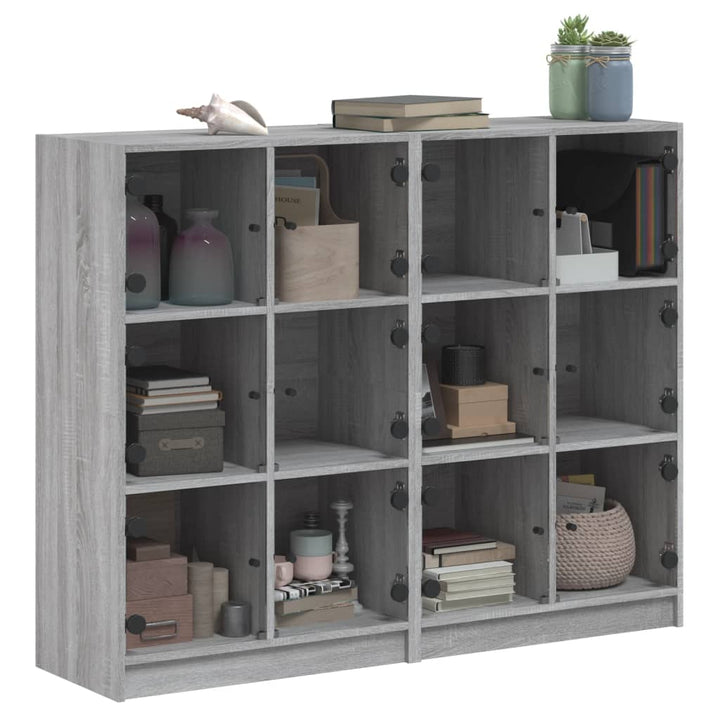 bogreol med låger 136x37x109 cm konstrueret træ grå sonoma