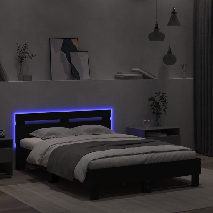 sengeramme med sengegavl og LED-lys 120x200 cm sort