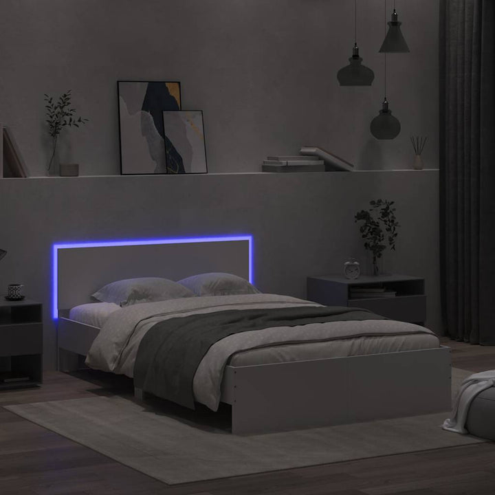 sengeramme med sengegavl og LED-lys 140x200 cm hvid