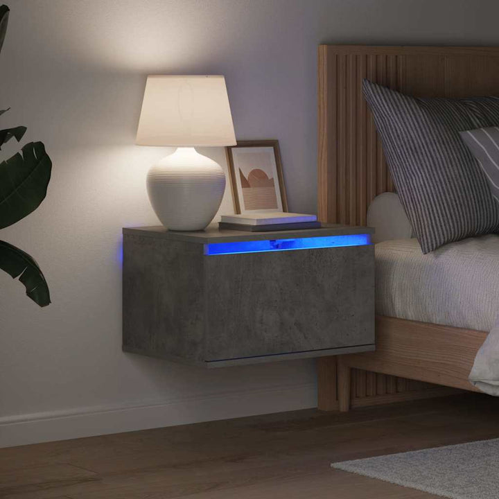 væghængt sengebord med LED-lys betongrå