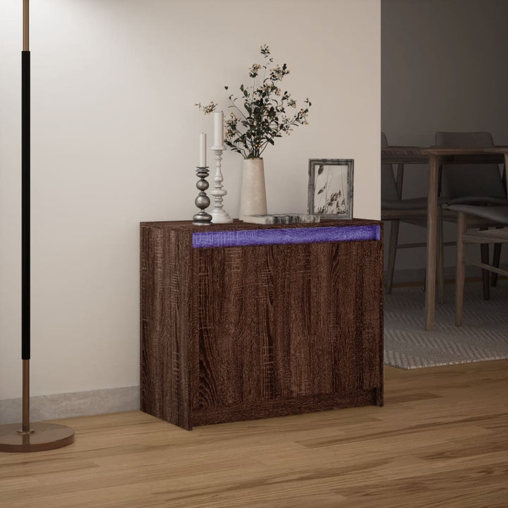 skab med LED-lys 72x34x61 cm konstrueret træ brun egetræsfarve