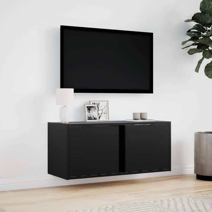 væghængt tv-bord med LED-lys 80x31x35 cm sort