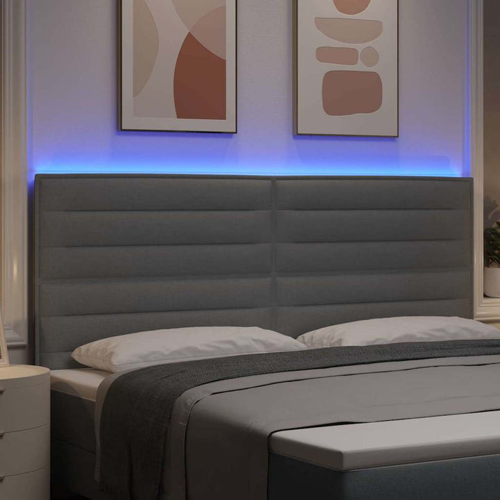 LED sengegavl med LED-lysstrimler Lysegrå 200 cm Stof