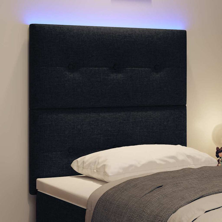 LED sengegavl med LED-lysstrimler Sort 100 cm Stof
