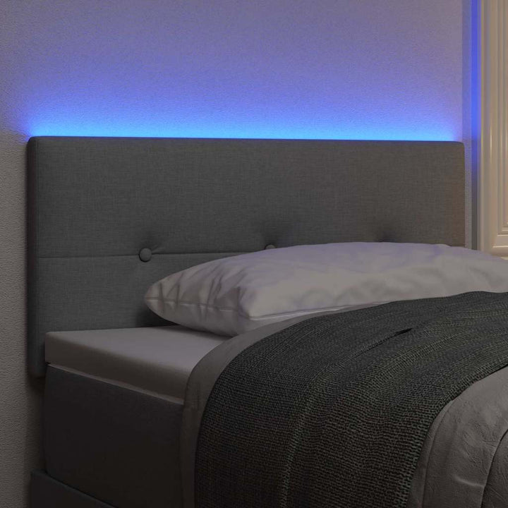 LED sengegavl med LED-lysstrimler Lysegrå 100 cm Stof