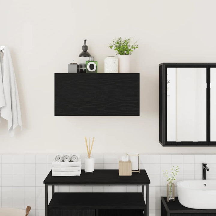 væghængt badeværelsesskab 60x25x30 cm konstrueret træ sort
