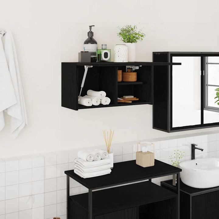 væghængt badeværelsesskab 60x25x30 cm konstrueret træ sort
