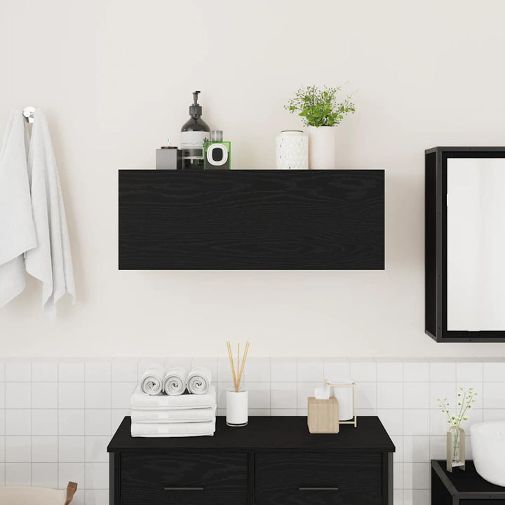 væghængt badeværelsesskab 80x25x30 cm konstrueret træ sort