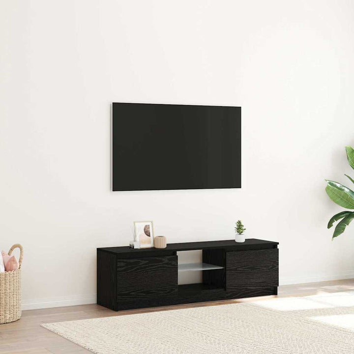 tv-bord med LED-lys 120x30x36 cm konstrueret træ sort egetræ