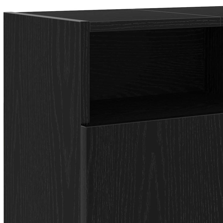 tv-bord med LED-lys 120x30x50 cm konstrueret træ sort egetræ