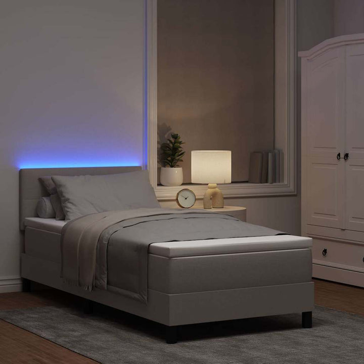 Box spring seng med LED-lysstrimler Gråbrun 90 x 190 cm Stof