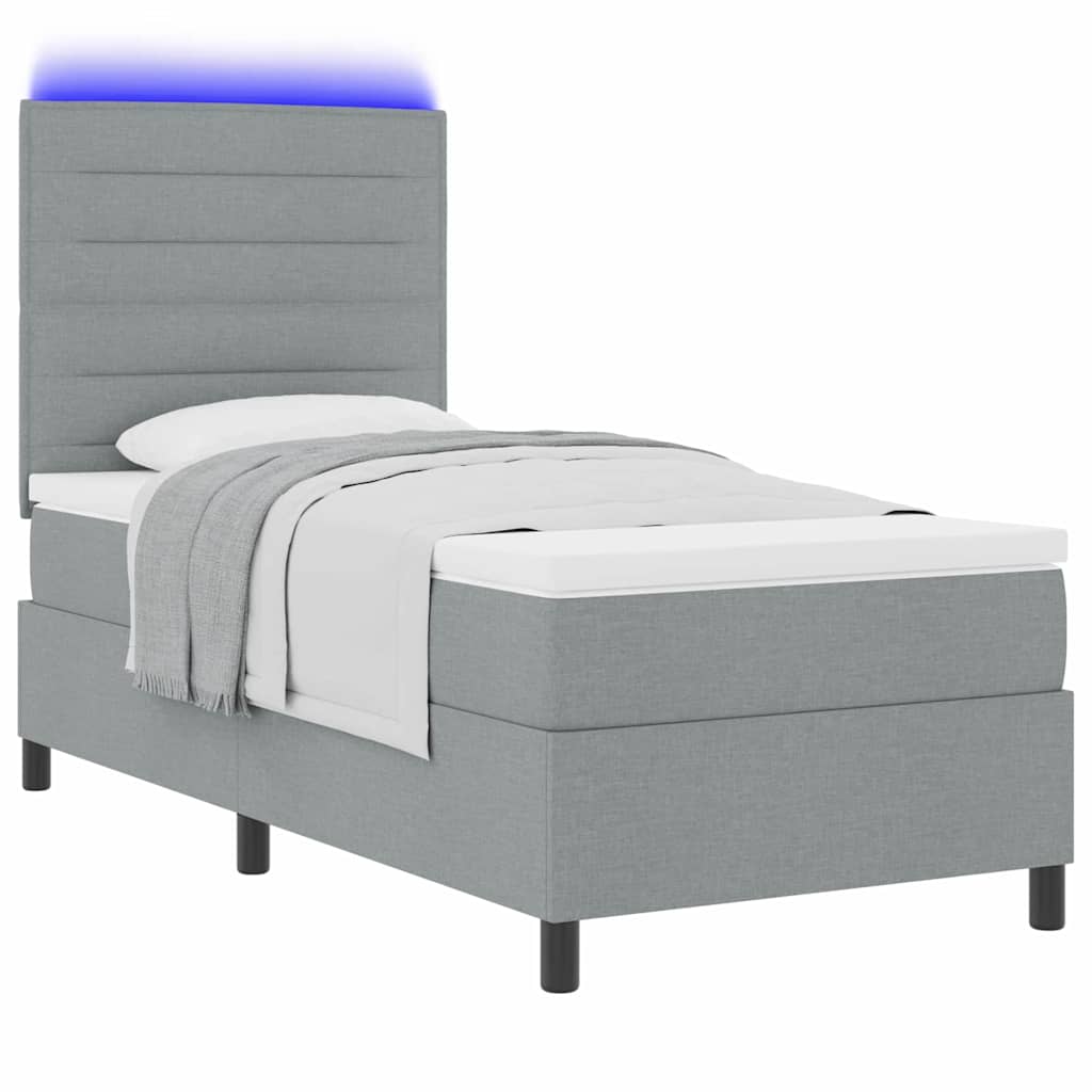 Box spring seng med madras med LED Lysegrå 90 x 200 cm Stof