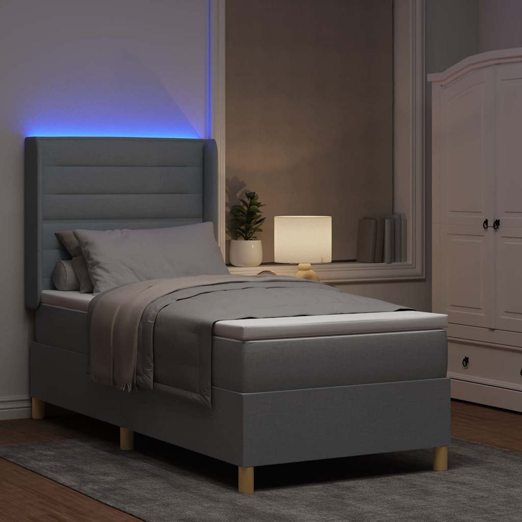 Box spring seng med LED-lysstrimler Lysegrå 90 x 190 cm Stof