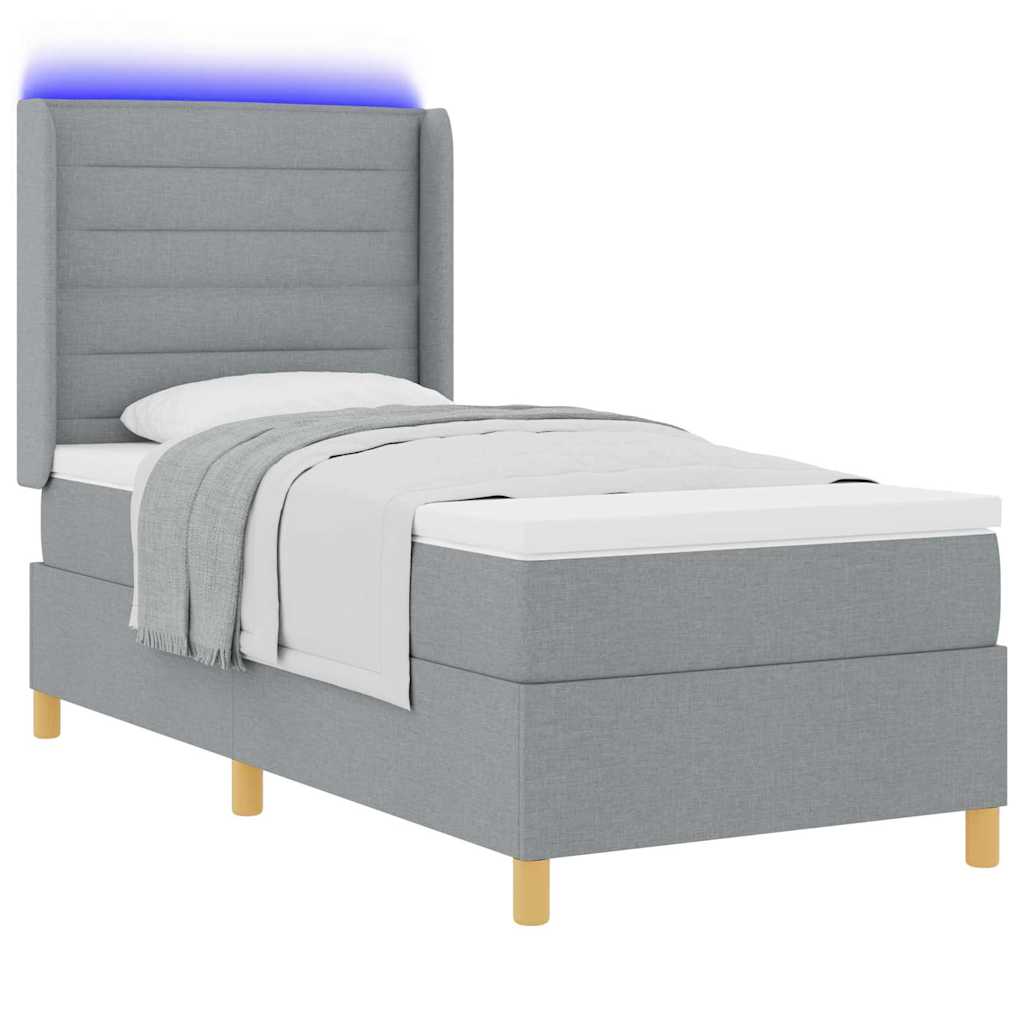 Box spring seng med LED-lysstrimler Lysegrå 90 x 190 cm Stof
