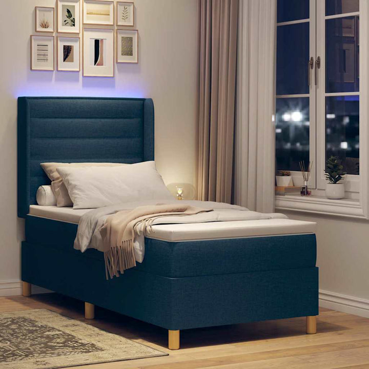 Box spring seng med LED-lysstrimler Blå 90 x 200 cm Stof