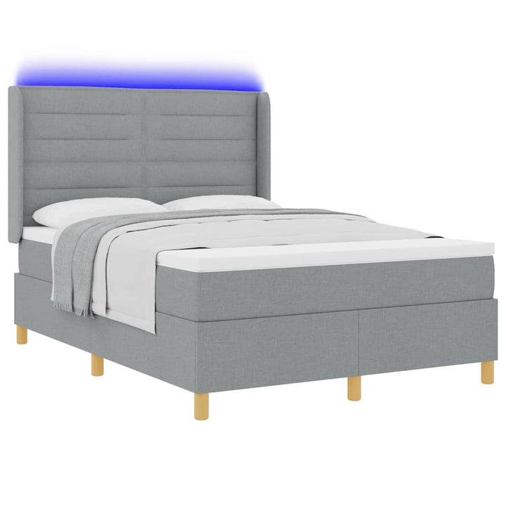 Box spring seng med LED-lysstrimler Lysegrå 140 x 190 cm Stof