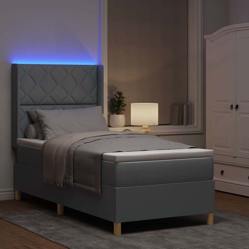 Box spring seng med LED-lysstrimler Lysegrå 90 x 200 cm Stof
