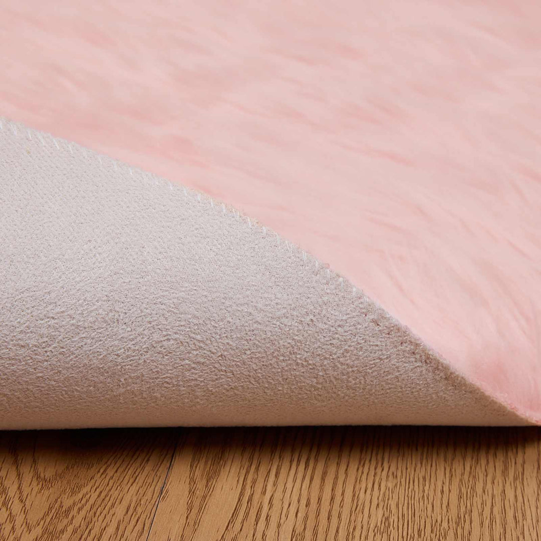 Fuskobbel lammeskindstæppe TAFALLA Lyserød Ø 160 cm Polyester