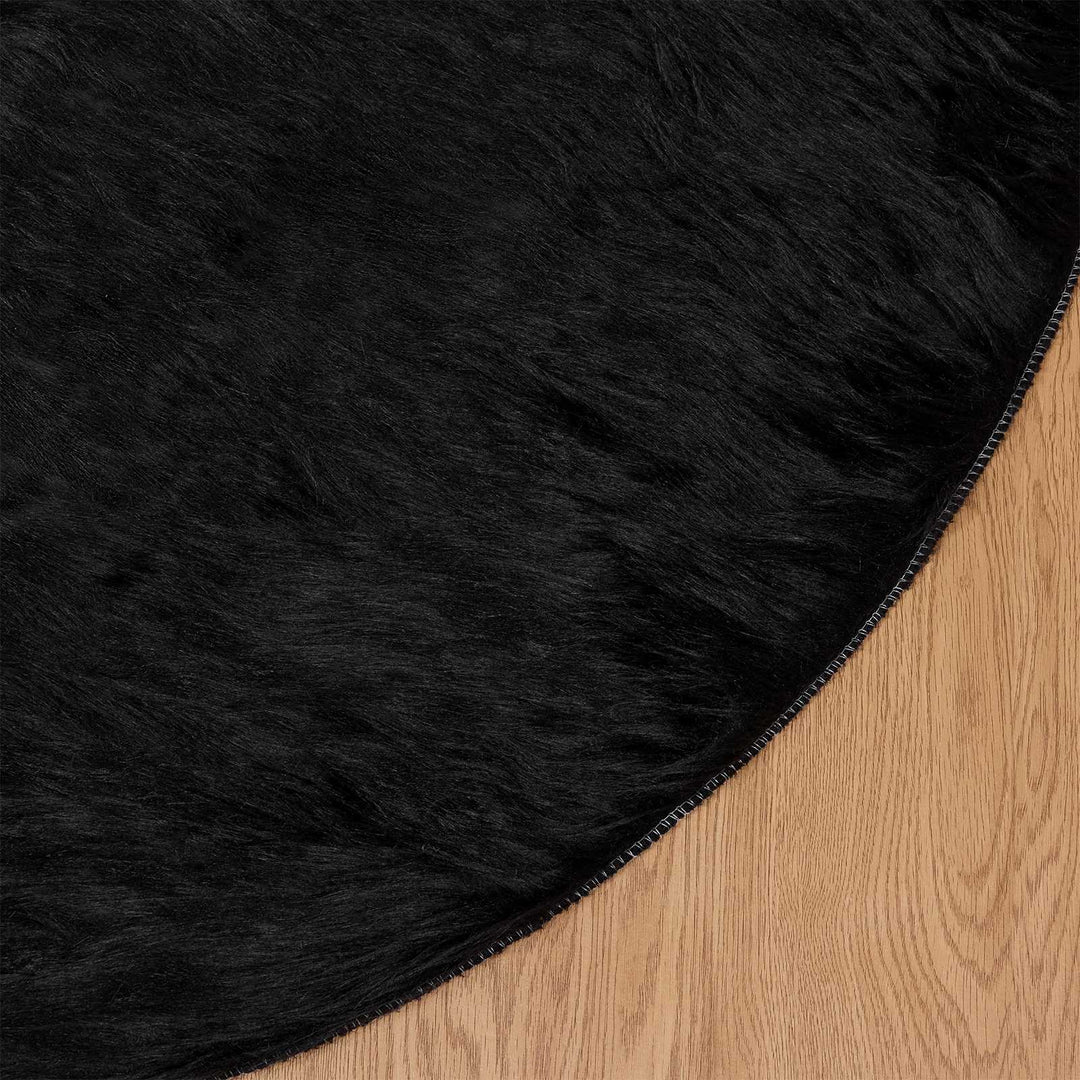 Fuskobbel lammeskindstæppe TAFALLA Sort Ø 120 cm Polyester