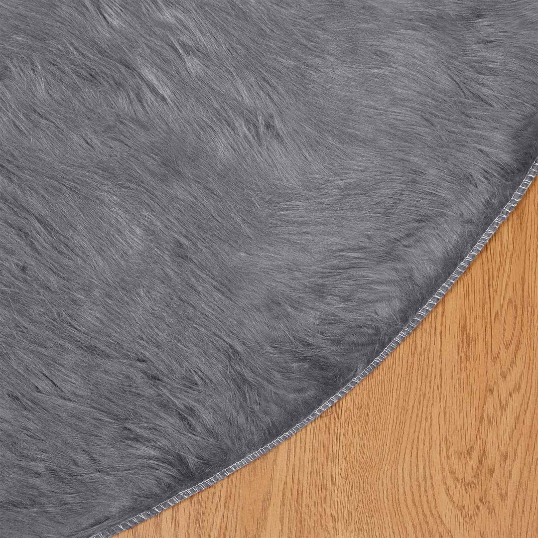 Fuskobbel lammeskindstæppe TAFALLA Antracit Ø 120 cm Polyester