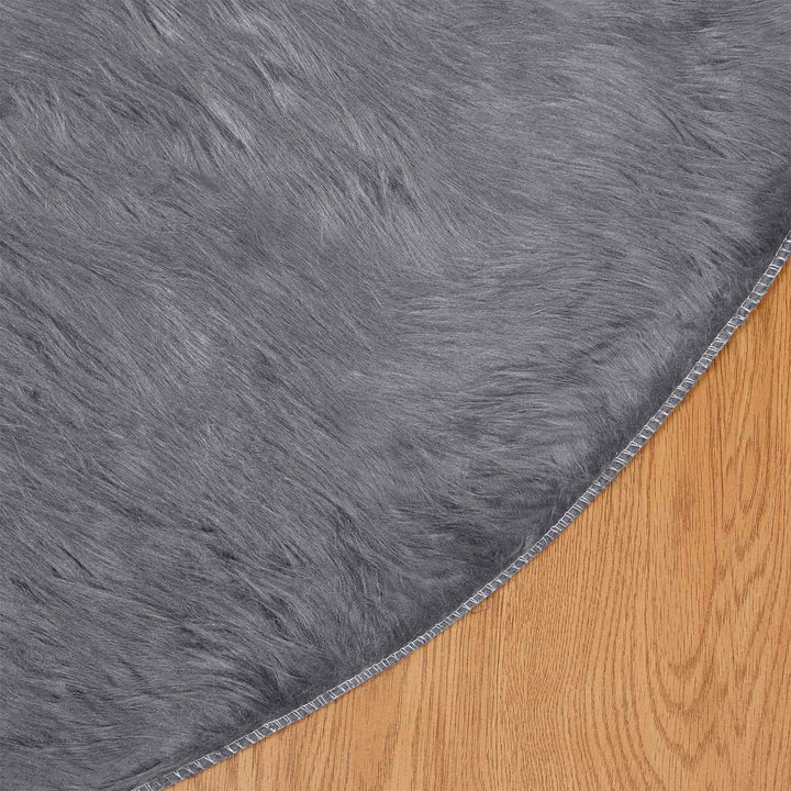 Fuskobbel lammeskindstæppe TAFALLA Antracit Ø 160 cm Polyester